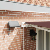 Manual Retractable Awning with LED Brown 500x300 cm 3215383