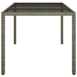 Garden Table 150x90x75 cm Tempered Glass and Poly Rattan Grey 316708