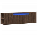 TV Wall Cabinet with LED Lights Brown Oak 135x31x39.5 cm 852389