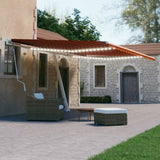 Manual Retractable Awning with LED 600x300 cm Orange and Brown 3069605