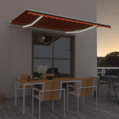Manual Retractable Awning with LED 400x300 cm Orange and Brown 3068905