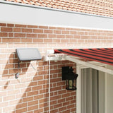 Retractable Awning Orange and brown 400 x 300 cm 3330506