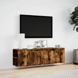 TV Wall Cabinet with LED Lights Smoked Oak 135x31x39.5 cm 852387